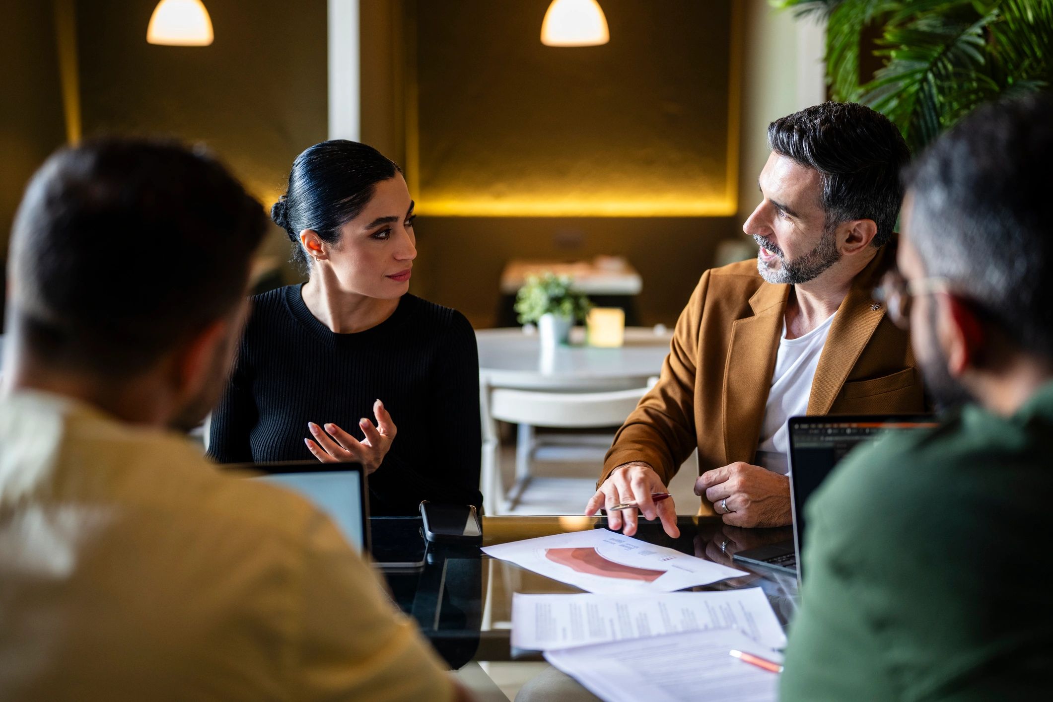 Business meeting discussion representing growth strategy alignment